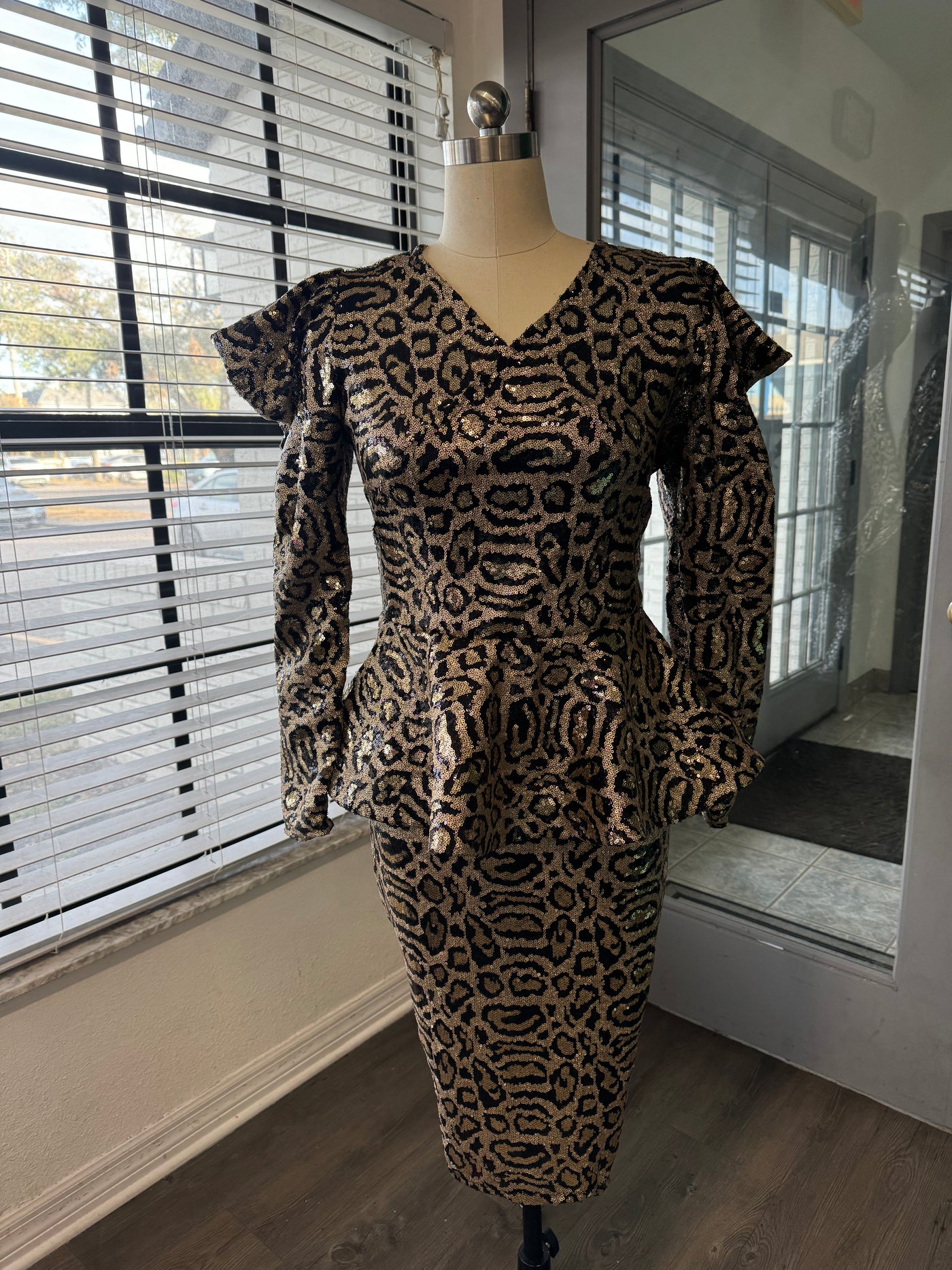 cheetah peplum dress Buy dress style 57477 designed by SherriHill