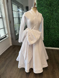 White swing dress with oversize bow