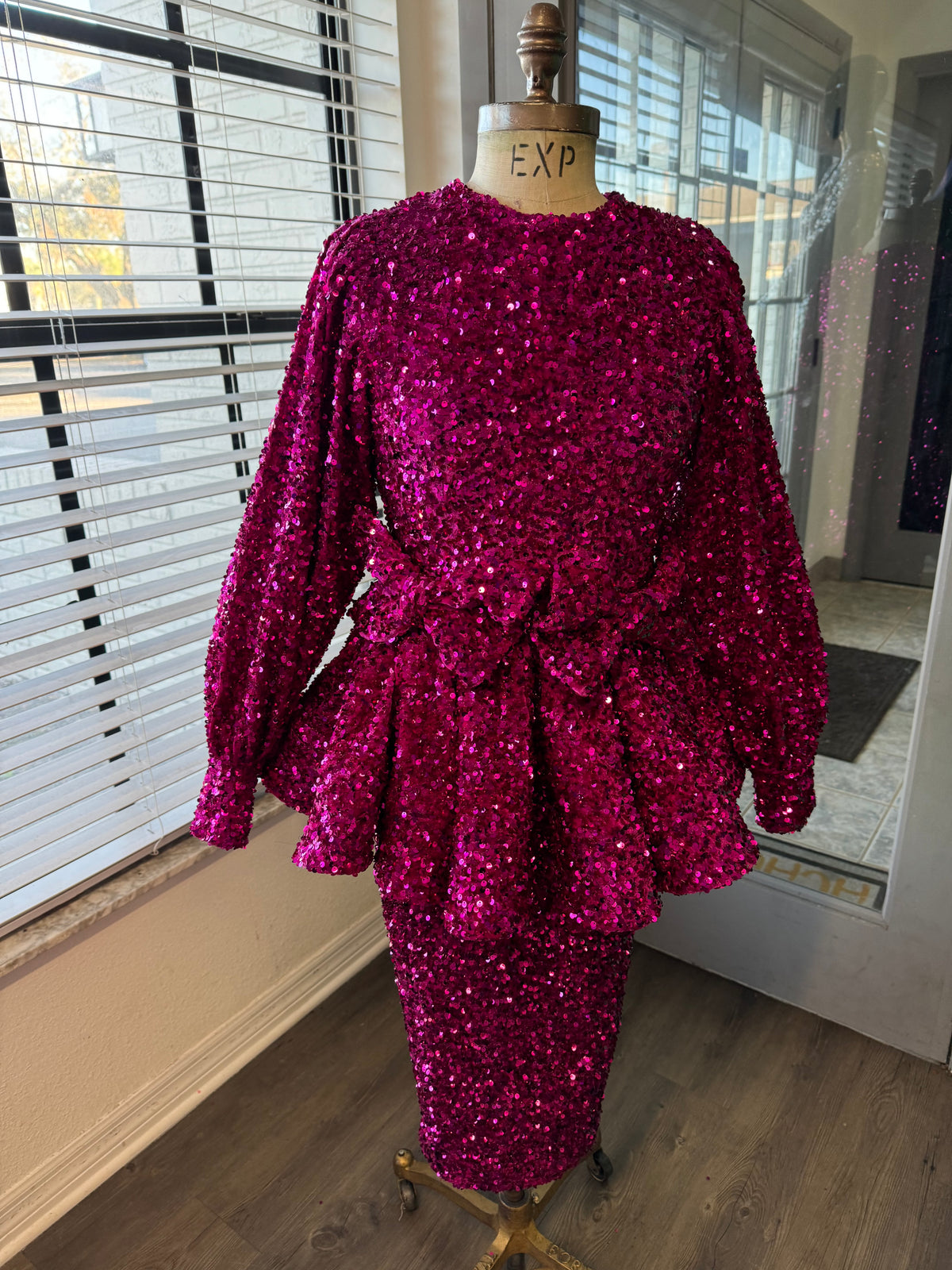 Magenta bow peplum dress