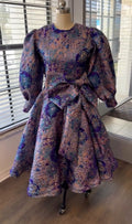 Purple brocade bow dress